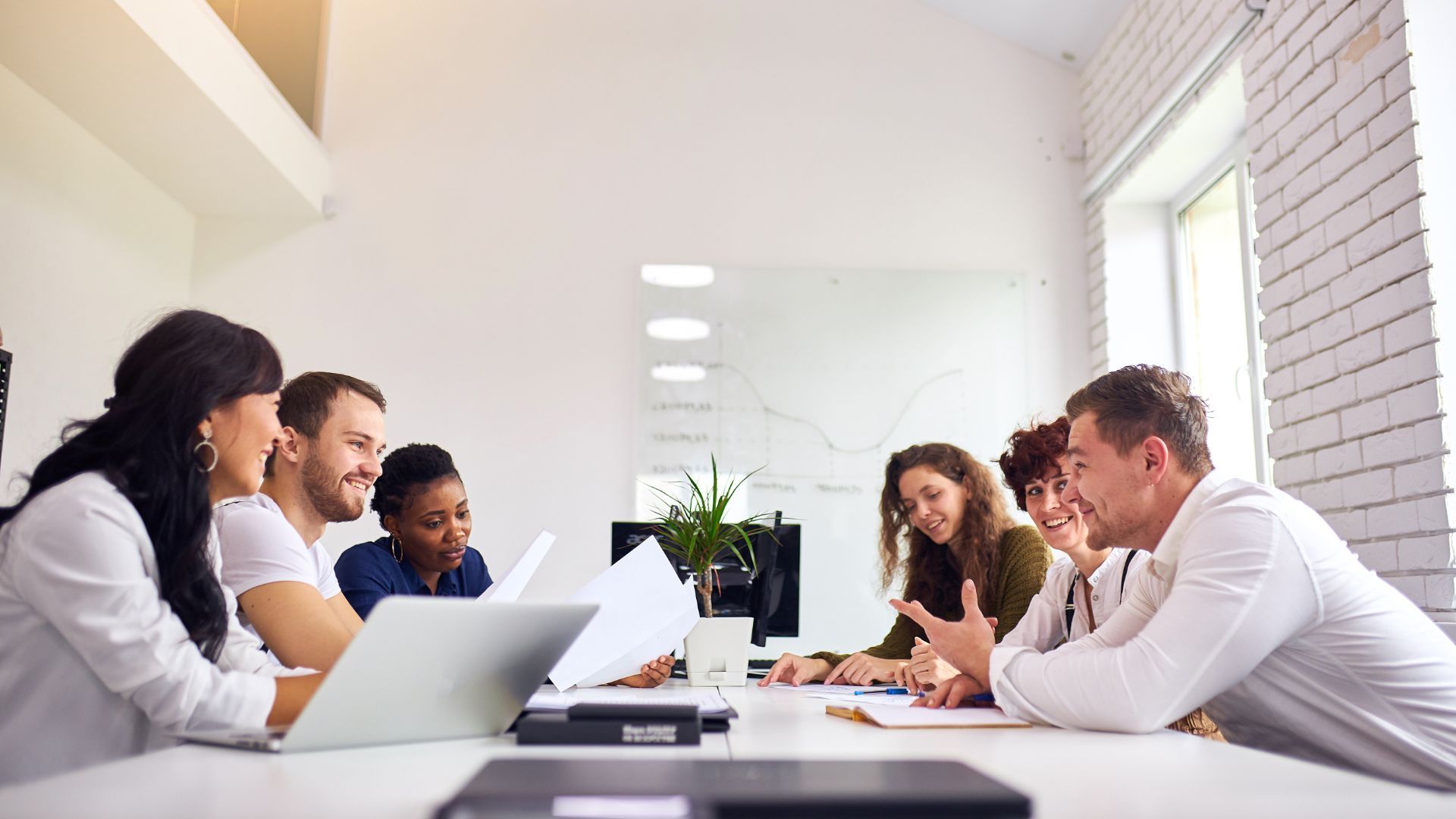 Team working around a table together